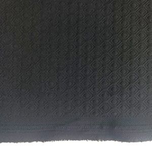 Embossed Black Diamond Polyester Knitwear Fabric.